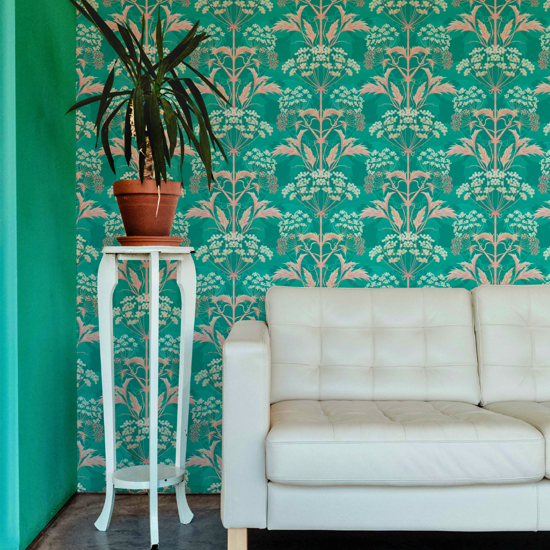 Crab Apple Jelly Hemlock Wallpaper behind cream leather sofa.