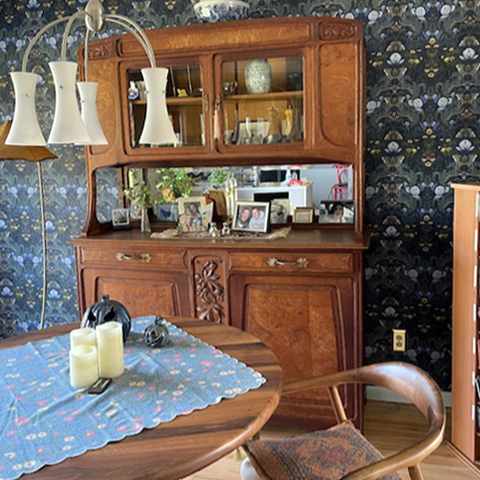 Dining Room, New Jersey, USA, Bloomsbury Moth Wallpaper with vintage oak sideboard and oak table in front of the wallpaper